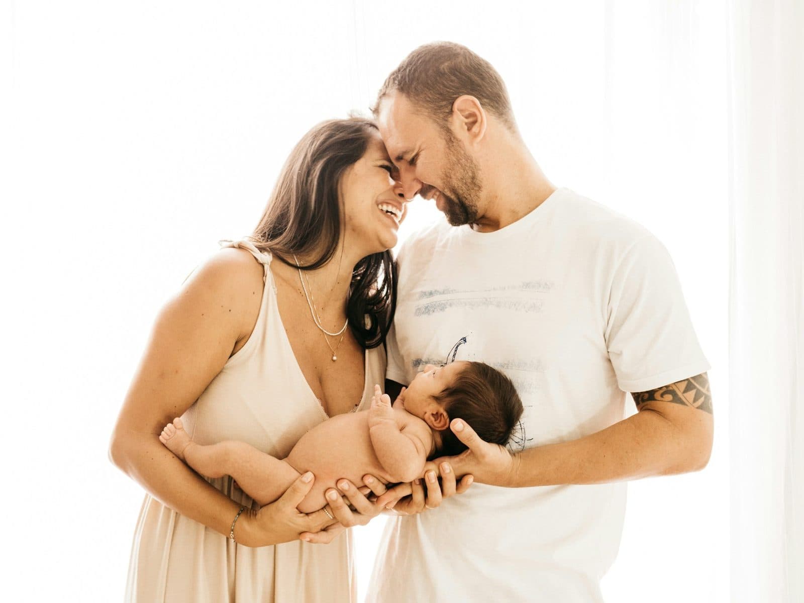 Parents holding their newborn